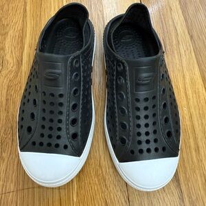 Skechers Black and White Perforated Slip-On Foamies